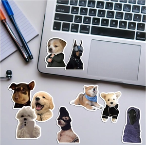 Funny realistic dog stickers on laptop and notebook featuring diverse breeds and outfits