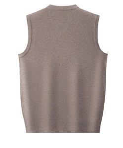 Detail view of the back of this knit vest, showing the ribbed hem and smooth brown fabric