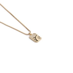 Minimalist gold evil eye rectangular pendant necklace with black enamel inlay