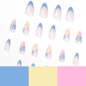 French blue tip almond press-on nails with delicate floral patterns on white background