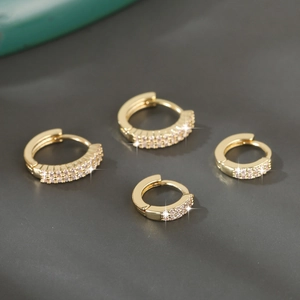 Luxury gold plated copper hoop earrings with pave set zircon crystals in multiple sizes