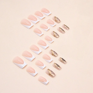 White French medium square press-on nails with golden leaf patterns and nude pink base