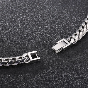 Polished silver stainless steel Cuban link necklace with secure fold-over clasp closure