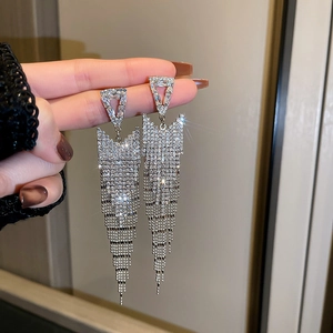Elegant silver long tassel drop earrings with sparkling rhinestones in triangle design
