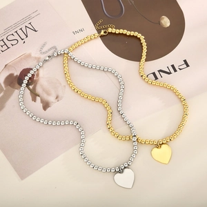 Minimalist stainless steel ball chain necklace with heart pendant in gold and silver finish