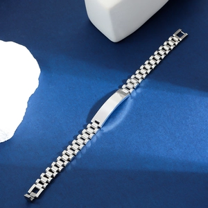 Detailed view of silver stainless steel watch-style bracelet with flat engravable nameplate