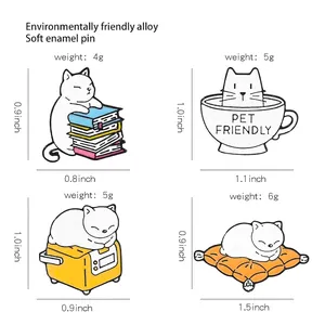 Cute cartoon white cat enamel pins set featuring books and coffee cup motifs