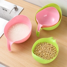 Nesting plastic kitchen colander set for washing rice and beans in pink and green