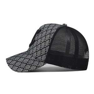 Classic checkered trucker hat with black mesh back and C-letter embroidery details