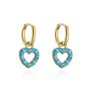 Detail of gold-plated hoop earring featuring a blue heart pendant with colorful crystals