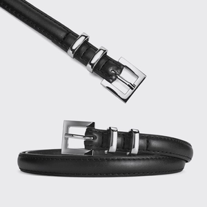 Minimalist black thin waist belt for women featuring a silver square buckle and sleek leather