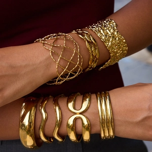 Chic gold-plated stainless steel cuff bracelets in woven, wavy and textured designs