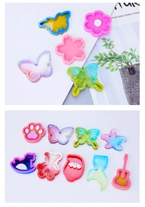 Detailed view of DIY resin silicone molds with glitter animal and floral shaped pendants