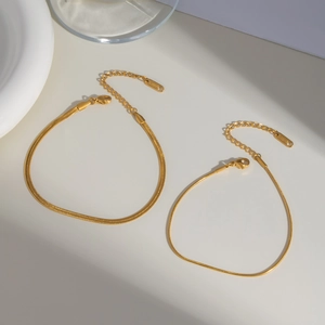 Set of two gold stainless steel snake chain anklets with adjustable lobster clasp links