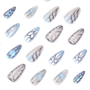 Y2K ice blue and silver 3D almond press-on nails with liquid metal heart patterns