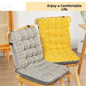 Detail view of cotton chair cushion with grey checkered pattern and secure black straps