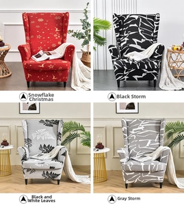 Detail showcasing four stylish patterned slipcovers for wingback chairs in home setting