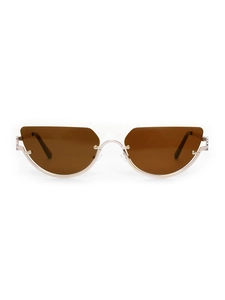 Detail of retro semi-rimless cat eye sunglasses with brown lenses and golden metal frames