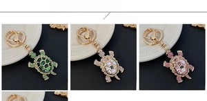 Detailed color display of rhinestone turtle keychains in green, white and pink colors