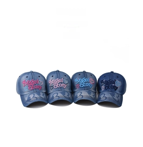 Detailed view of four denim baseball caps featuring high-quality Angel Story embroidery
