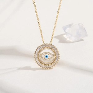 Detailed view of evil eye necklace with gold plating and sparkling blue zircon stones