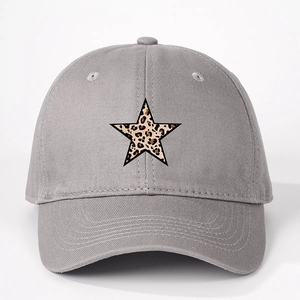Detail of grey cotton baseball cap featuring a leopard print star and breathable eyelets