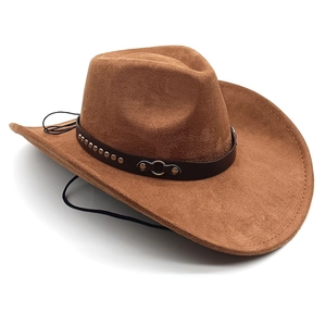 Detail of camel suede cowboy hat with brown leather band and silver metallic studs