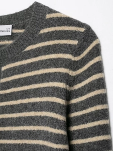 Detailed view of striped knit cardigan collar and soft brushed mohair texture