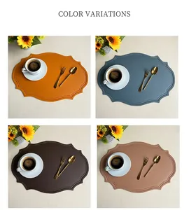 Detail showing wavy edges and dot embossing on four assorted color faux leather placemats