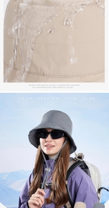 Close-up showing waterproof fabric coating with water droplets on a warm bucket hat