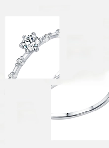 Macro detail of S925 hallmark and pave-set Moissanite diamonds on silver band