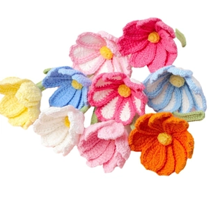 Handmade crochet flower bouquet with multi-color petals on a clean white background