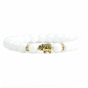 Close-up of white agate beaded bracelet with a golden elephant charm and crystal spacers
