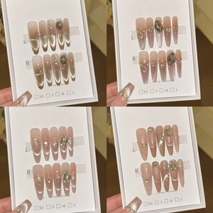 Handmade cat eye press-on nails set with glitter, rhinestones and gradient brown finish