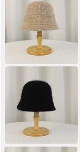 Close-up of thick knitted bucket hats in khaki and black with fuzzy mohair texture