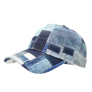 Retro denim-print baseball cap with blue and white patchwork patterns shown in side view