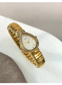 Detailed close-up of water-drop dial with sparkling crystals on a golden GEDI luxury watch