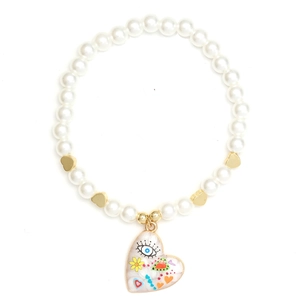 Close-up of pearl bracelet featuring gold hearts and a colorful evil eye heart pendant