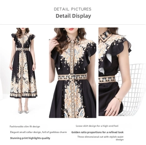 Detail of paisley print maxi dress featuring a turn-down collar and ruffle sleeves