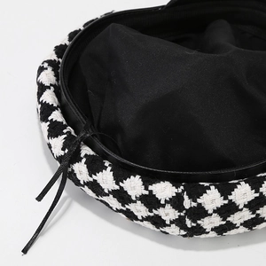 Classic houndstooth octagonal hat featuring inner lining and adjustable drawstring cord