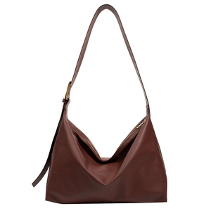 Minimalist large brown hobo tote bag in matte leather with adjustable shoulder strap