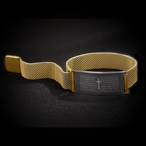 Gold mesh bracelet with dark metal plate engraved with Spanish Lord's Prayer and cross
