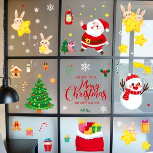 Christmas window decals with Santa and tree motifs for festive glass door decoration