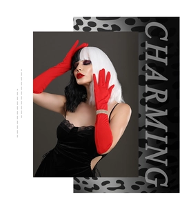 Detail view of Cruella cosplay kit with black and white wig and red satin gloves