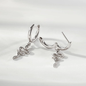 Silver snake drop earrings with minimalist hoop design and tiny inlaid gemstone
