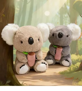Close-up of cute beige and grey koala plush toys with fluffy ears in a warm forest setting