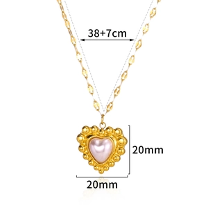Detailed view of the pink pearl heart pendant on a gold chain with 20mm size dimensions