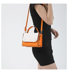 Detail of the white and orange contrast stitching PU leather crossbody bag for women