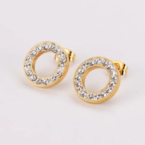Gold stainless steel hoop earrings with clear crystals shown on a white background