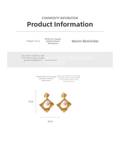 Detail view of geometric gold-plated earrings with pearls and rhinestones